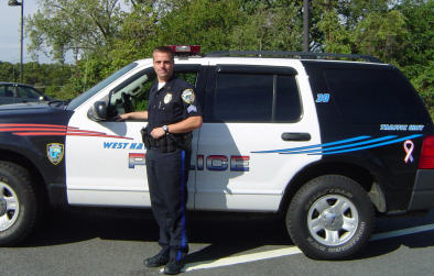 Traffic Officer Next to His Patrol Vehicle
